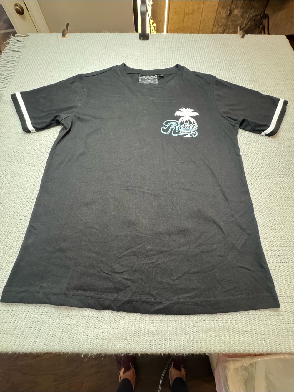 rebels Black Tee with White Trim and Palm Logo